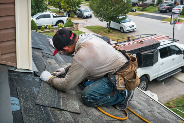 Professional Roof Replacement technician working in Dunlow, WV